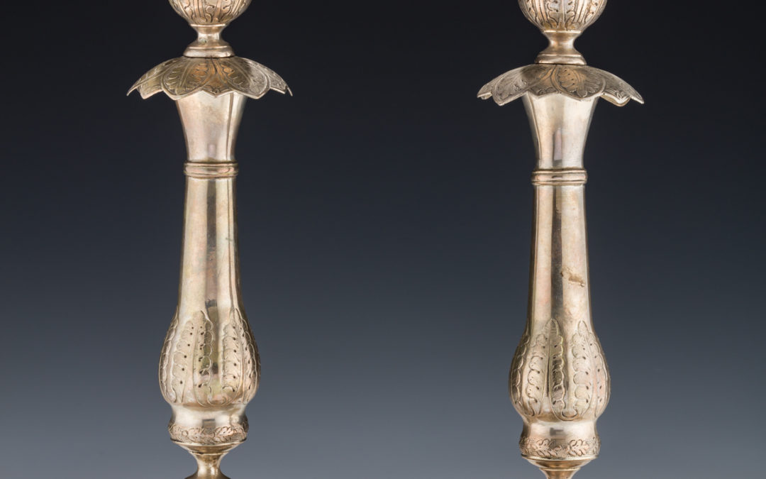 010. A Pair of Large Silver Candlesticks