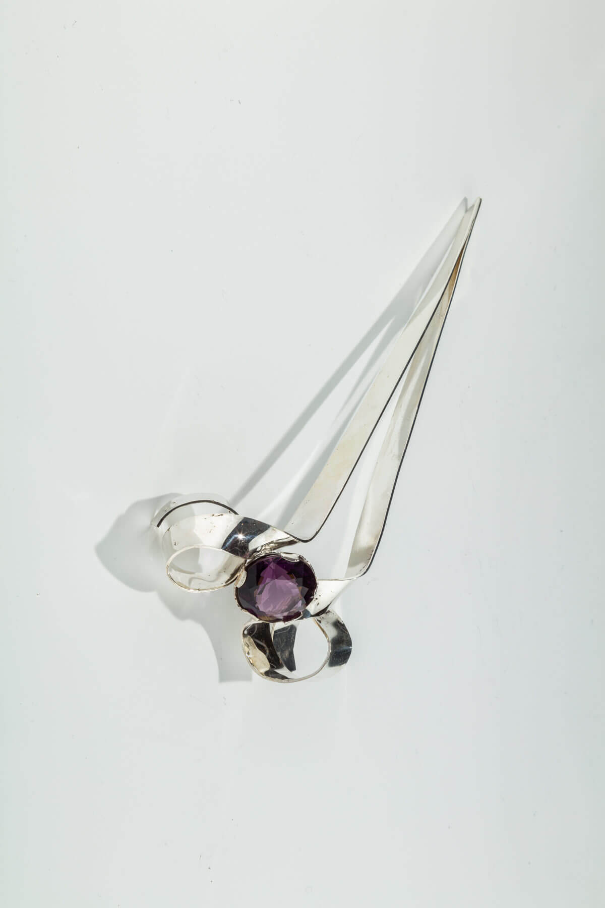 140. A Sterling Silver and Amethyst Torah Pointer by Harold Rabinowitz