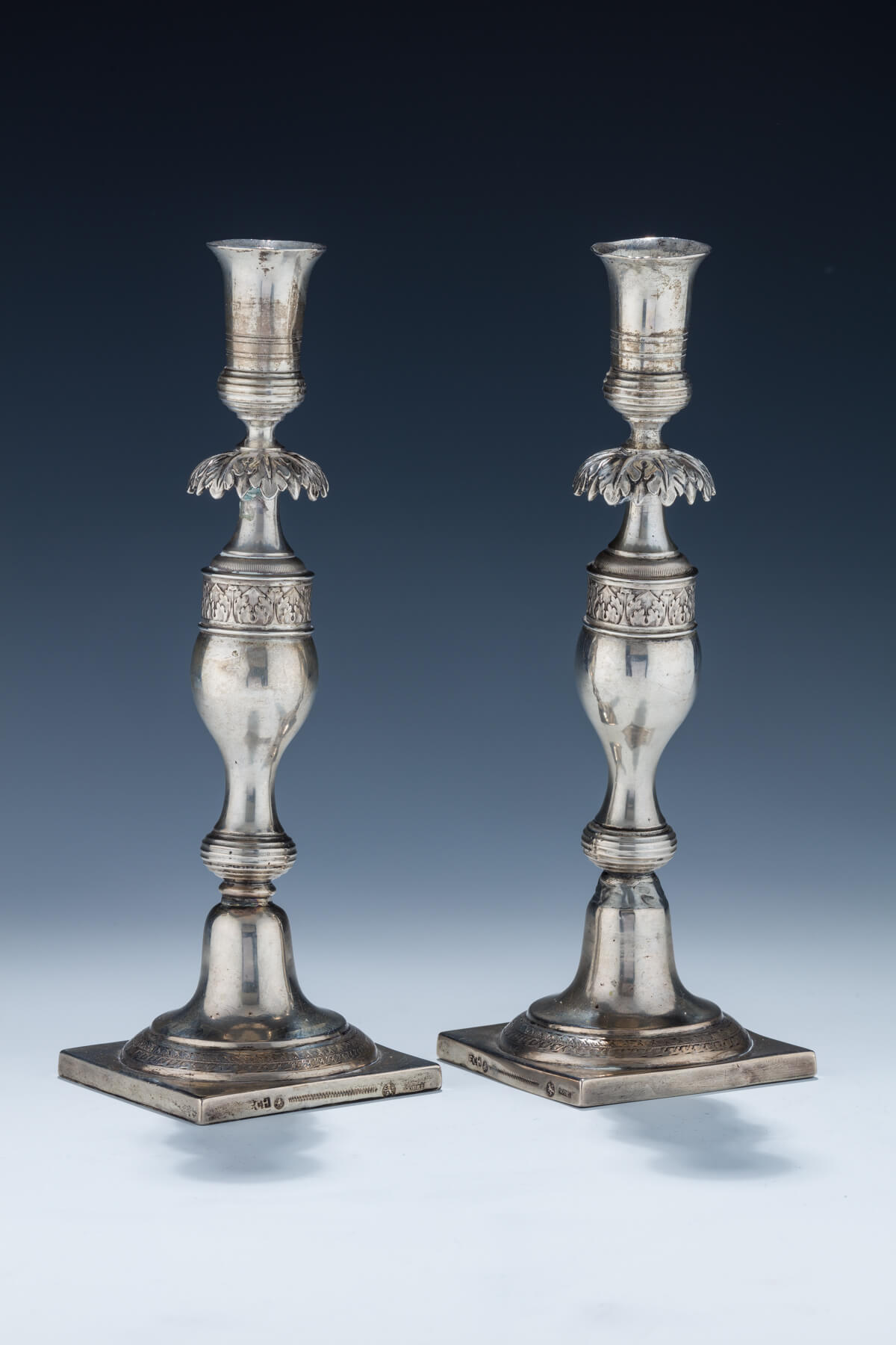 34. A Pair of Silver Candlesticks