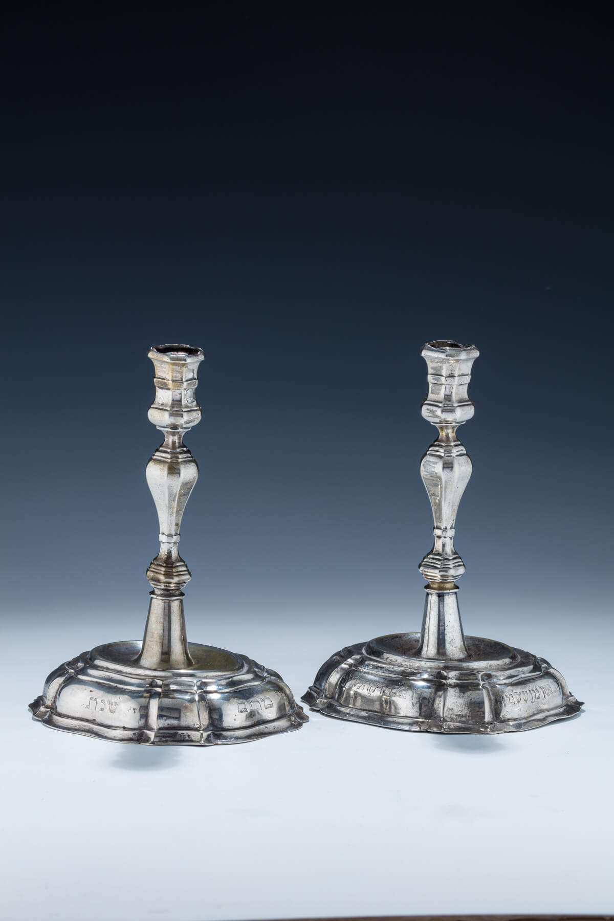 124. An Exceptionally Rare Pair of Silver Candlesticks