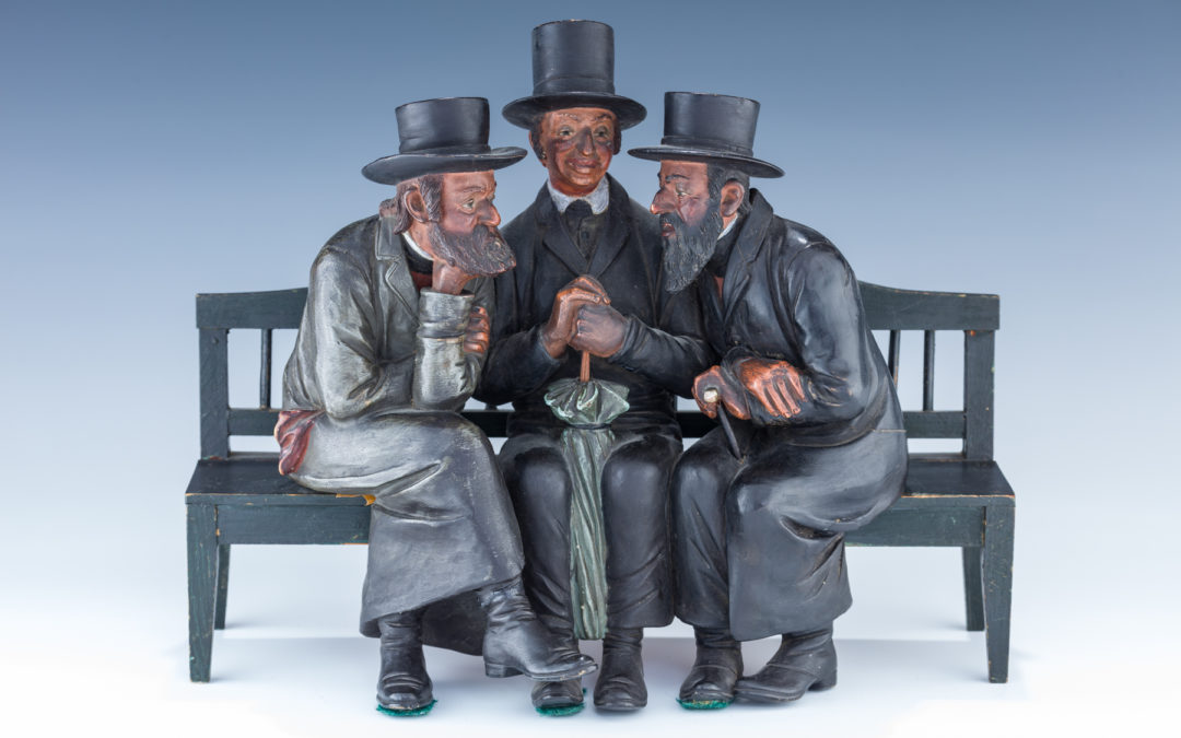30. A Plaster Sculpture Of Three Jews On A Bench