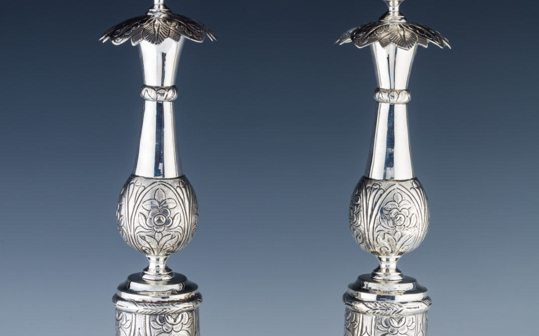 3. A Massive Pair Of Silver Candlesticks