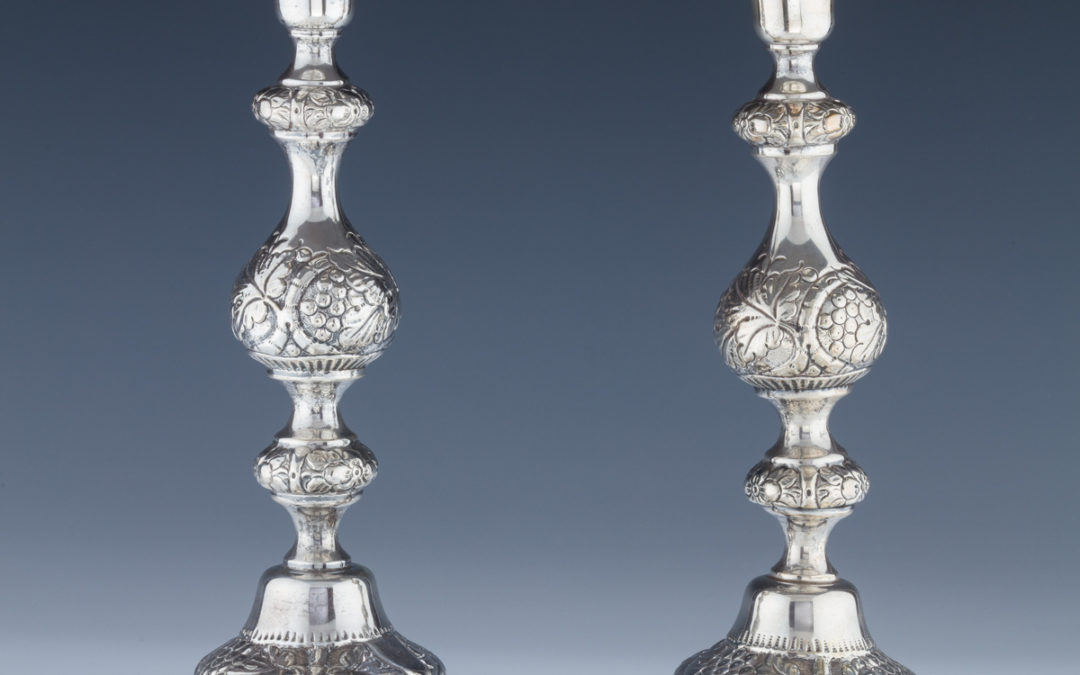 001. A Pair of Large Silver Candlesticks
