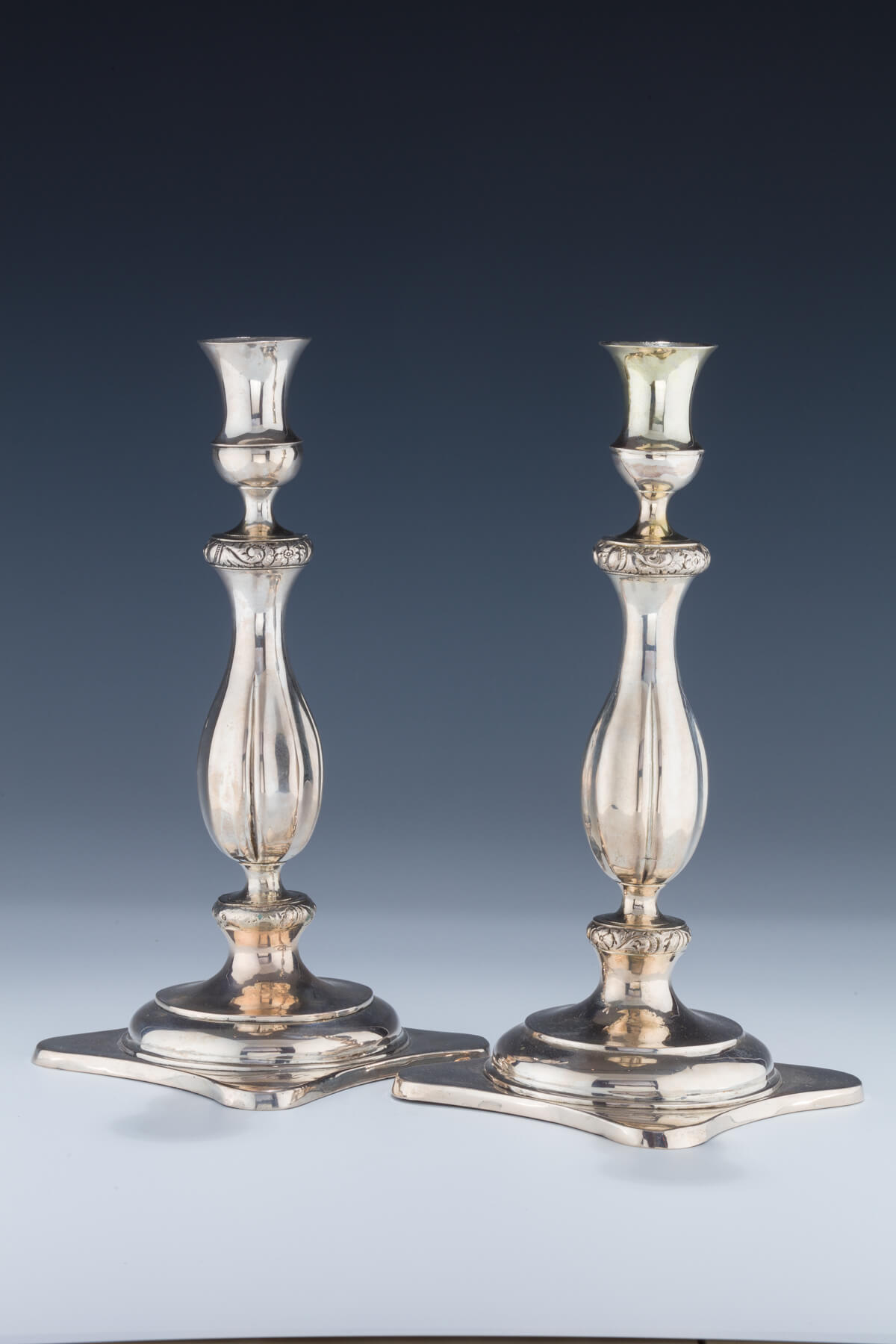 077. A Pair of Silver Candlesticks