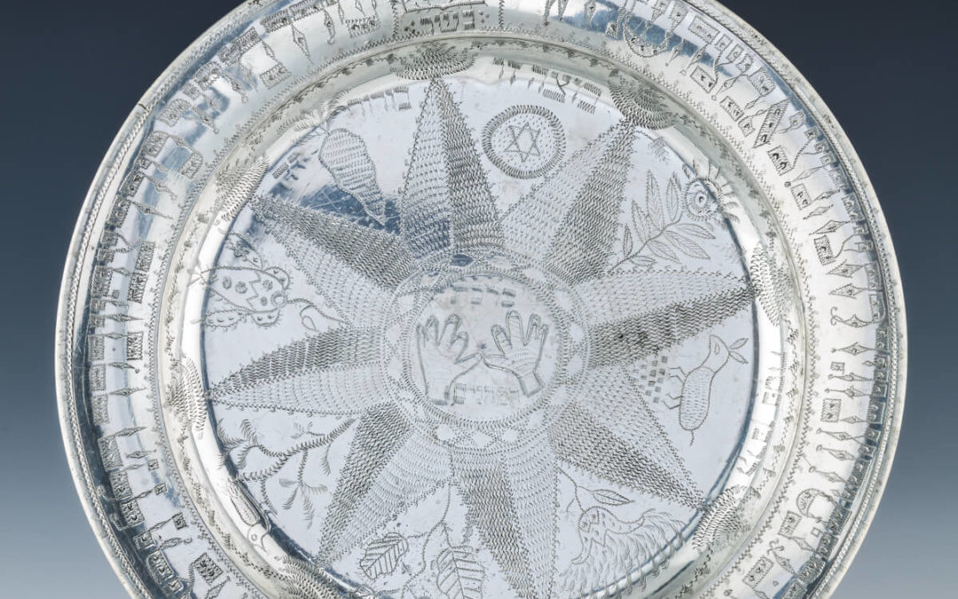 065. A LARGE AND RARE PEWTER SEDER DISH