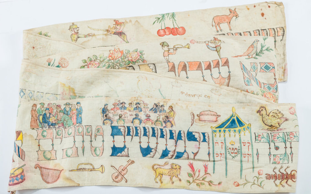 027. AN EARLY AND WELL DECORATED TORAH WIMPLE