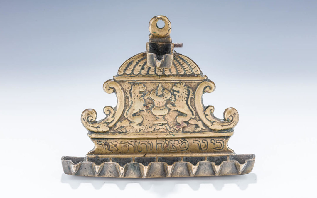 051. AN EARLY AND IMPORTANT BRASS HANUKKAH LAMP
