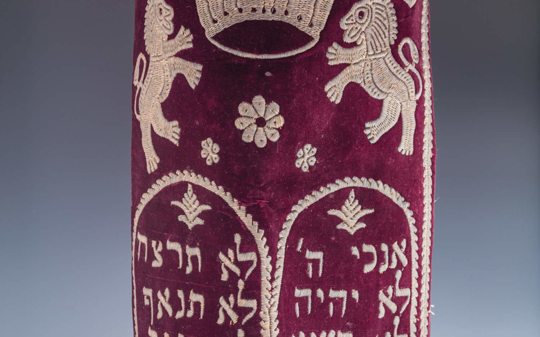 022. A VELVET AND SILVER WIRE TORAH TIK COVER