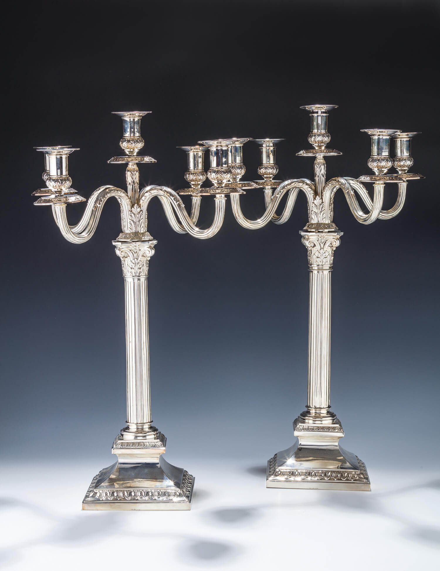 092. A MONUMENTAL PAIR OF SILVER FIVE LIGHT CANDELABRAS BY LAZARUS POSEN