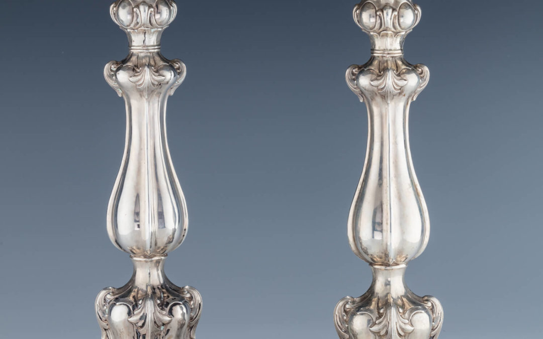 031. A PAIR OF SILVER CANDLESTICKS