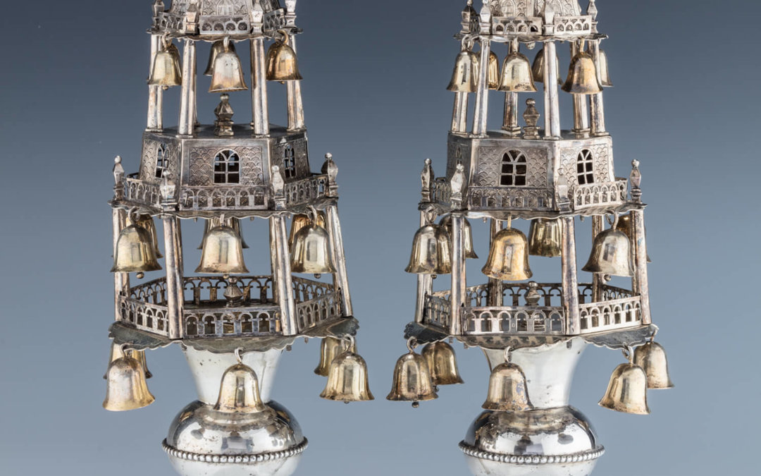 108. A RARE AND IMPORTANT PAIR OF SILVER TORAH FINIALS