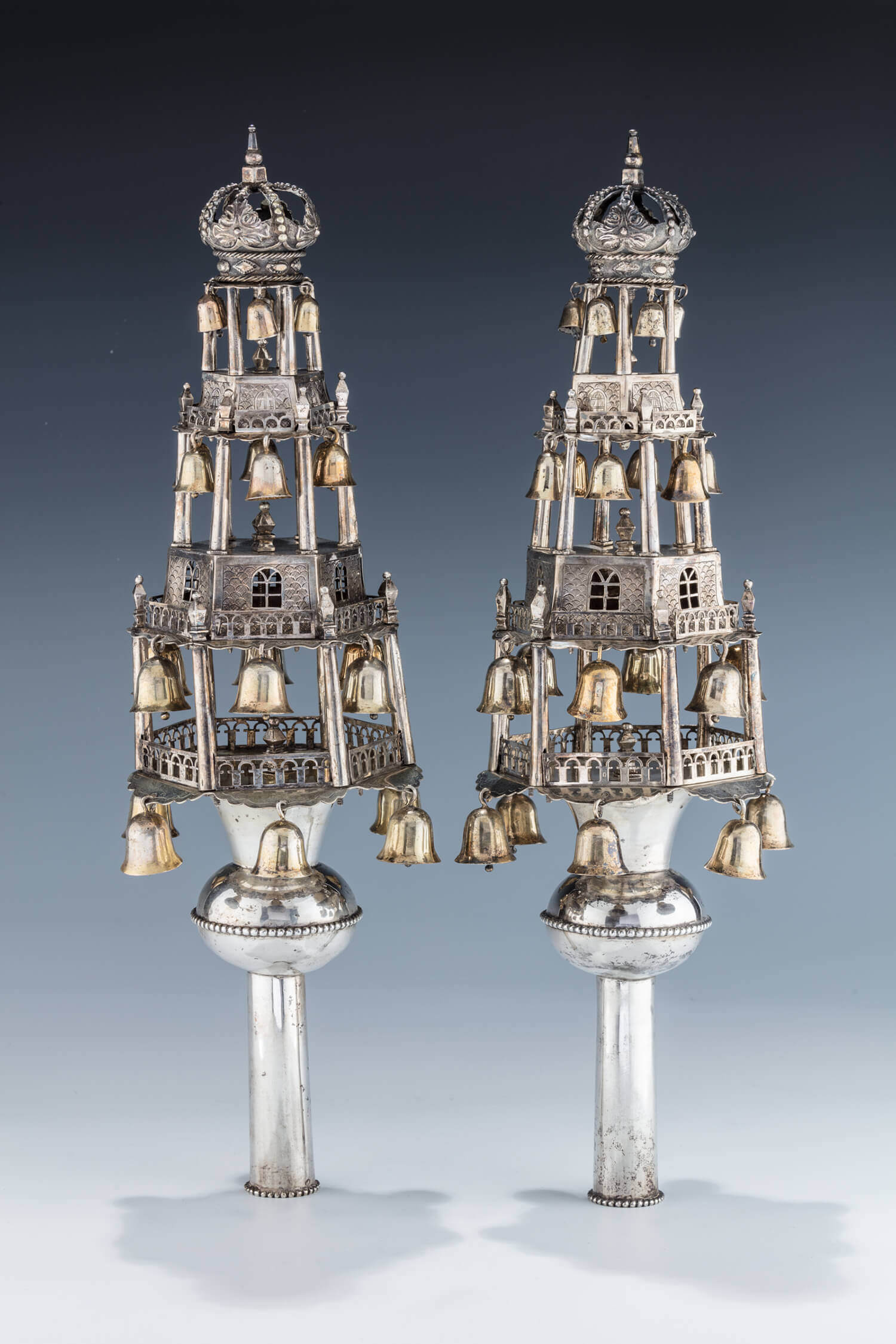 108. A RARE AND IMPORTANT PAIR OF SILVER TORAH FINIALS