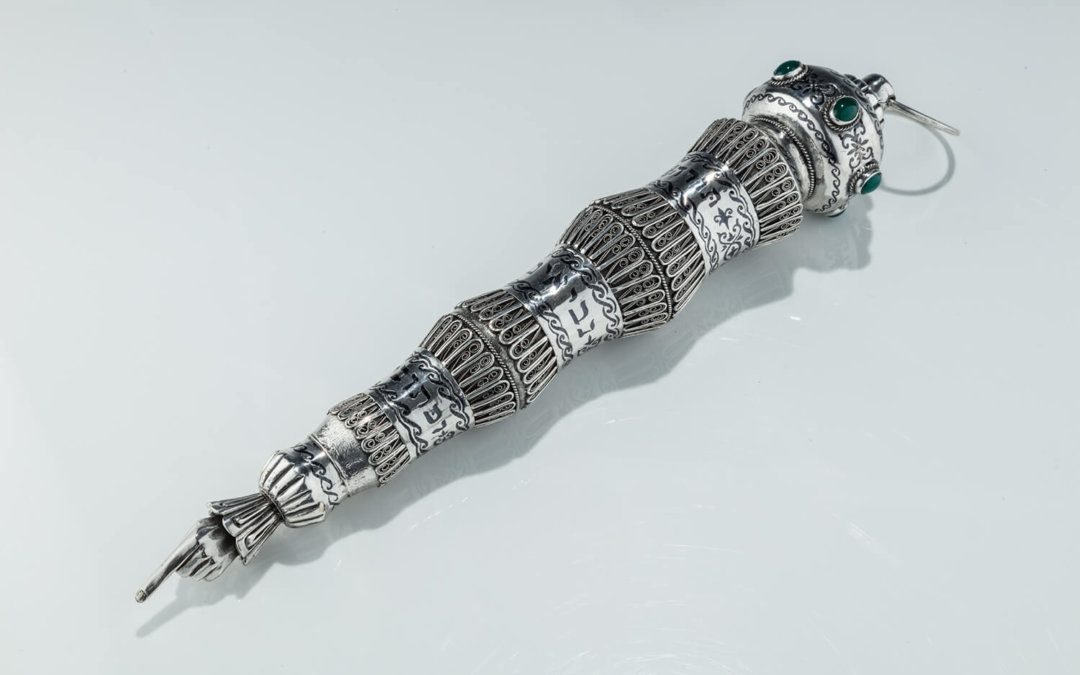 137. A MONUMENTAL STERLING SILVER AND NIELLO TORAH POINTER BY HENRYK WINOGRAD