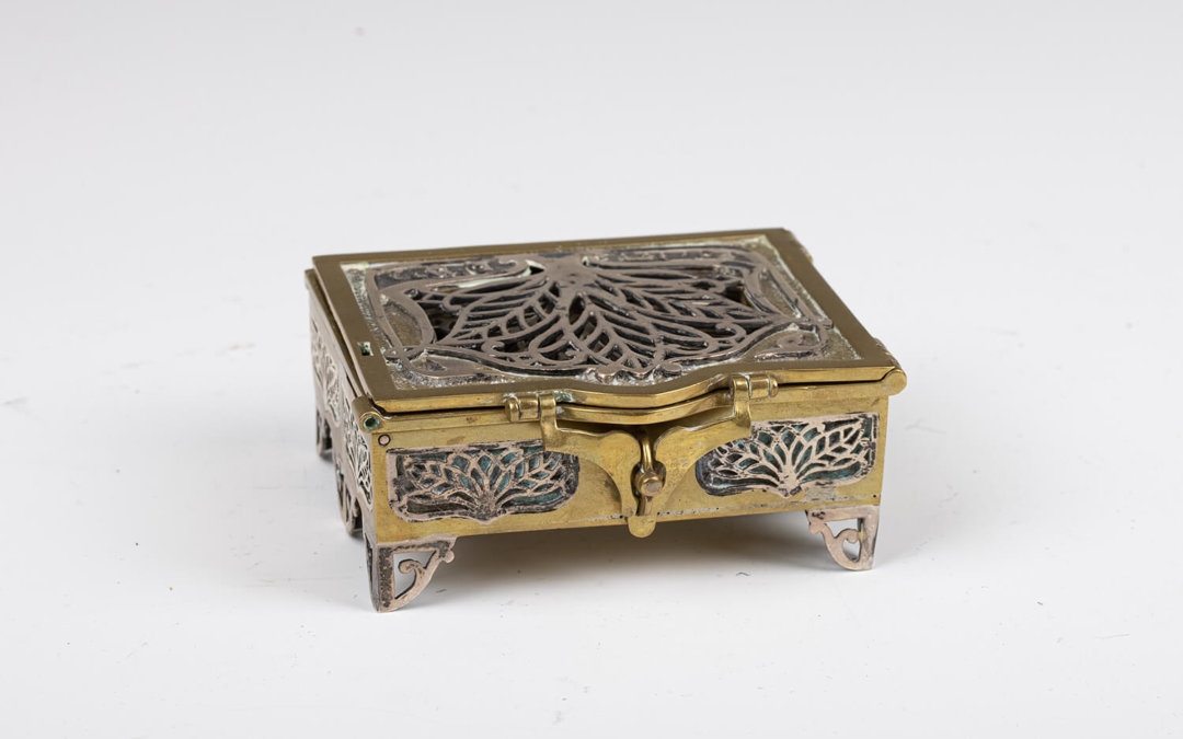 149. A BRASS AND STERLING SILVER SPICE BOX BY SWED MASTER SILVERSMITHS