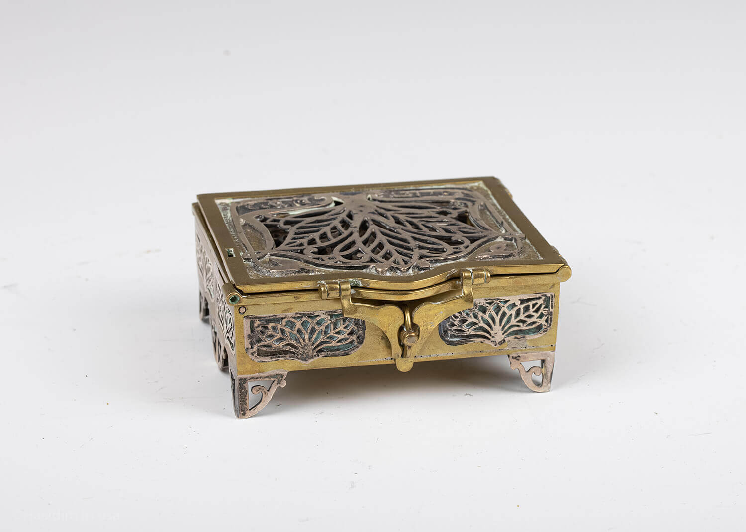 149. A BRASS AND STERLING SILVER SPICE BOX BY SWED MASTER SILVERSMITHS