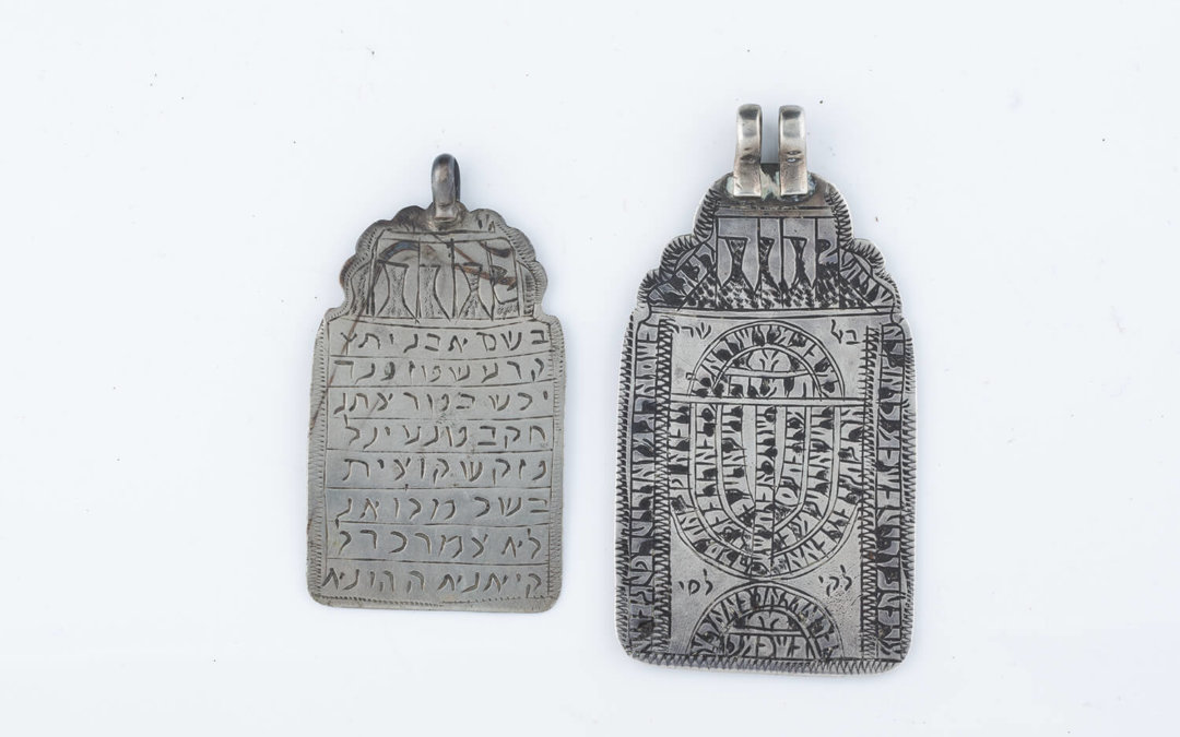 025. TWO SILVER TABLET FORM AMULETS