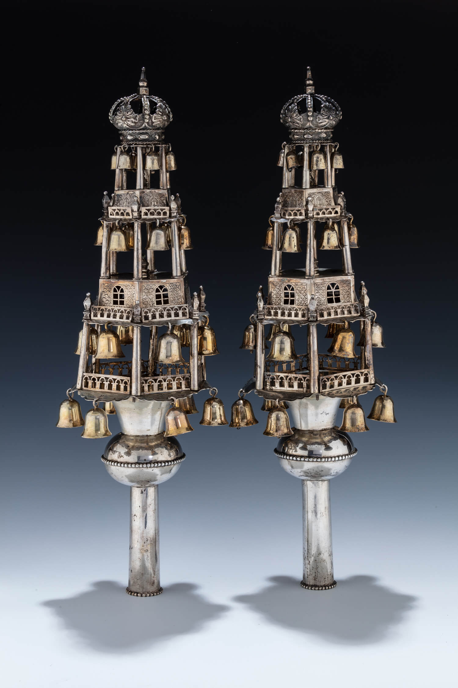 144. A RARE AND IMPORTANT PAIR OF SILVER TORAH FINIALS